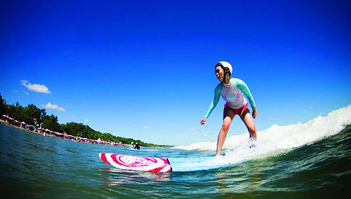 Surfing in Sanur Beach